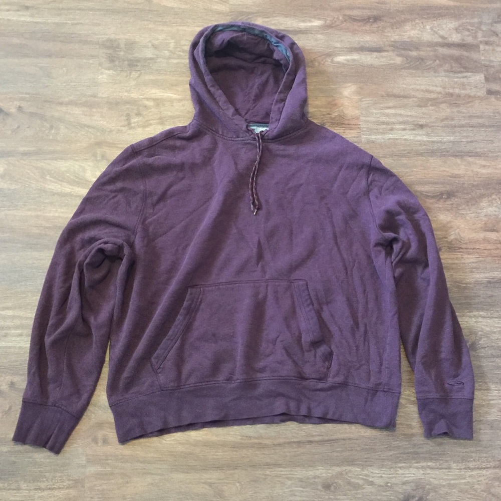 Maroon sweatshirt.